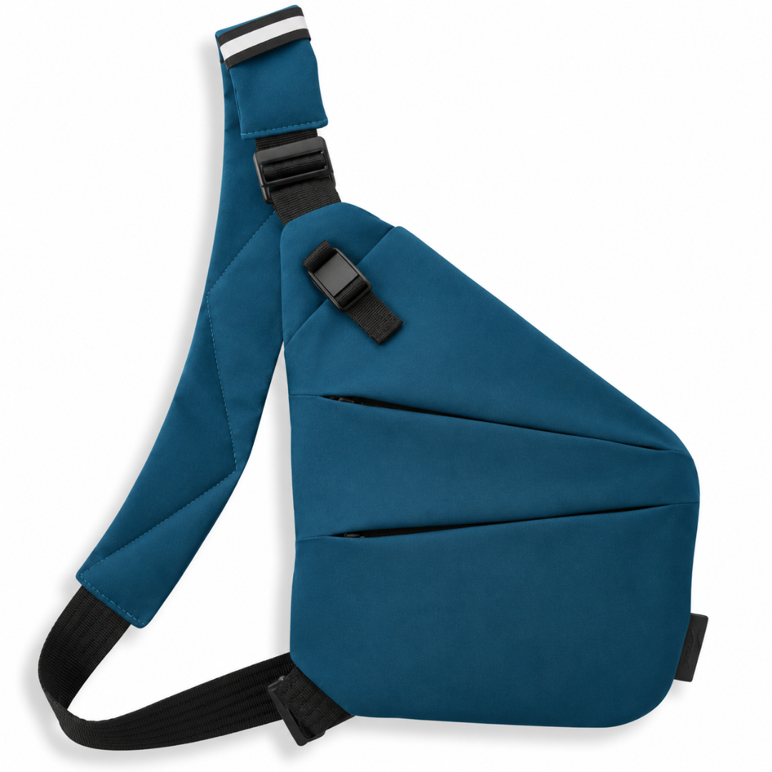 Vaultline anti-theft crossbody bag in Teal, left shoulder