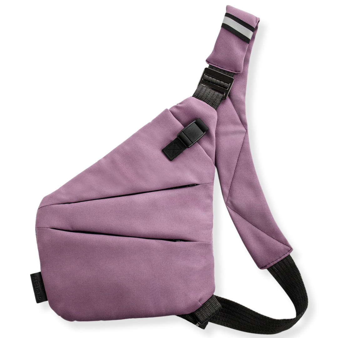 Vaultline anti-theft crossbody bag in Berry, right shoulder