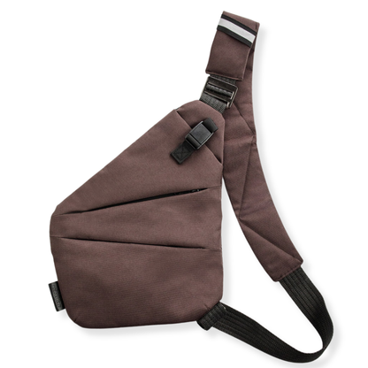 Vaultline anti-theft crossbody bag in Brown, right shoulder