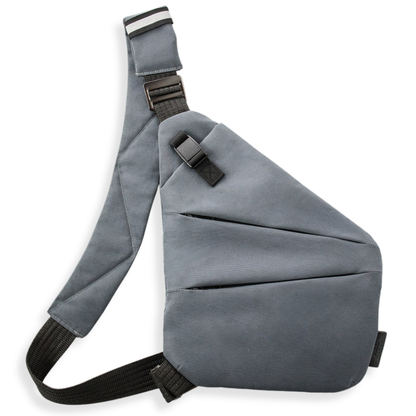Vaultline anti-theft crossbody bag in Grey, left shoulder