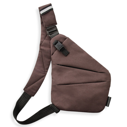 Vaultline anti-theft crossbody bag in Brown, left shoulder
