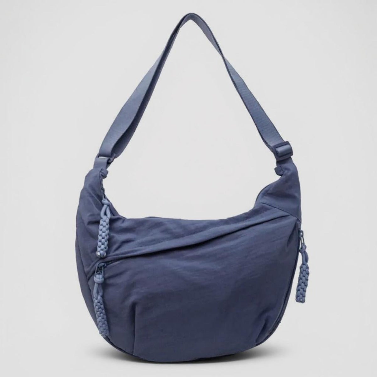 Elina crescent sling bag in Blue