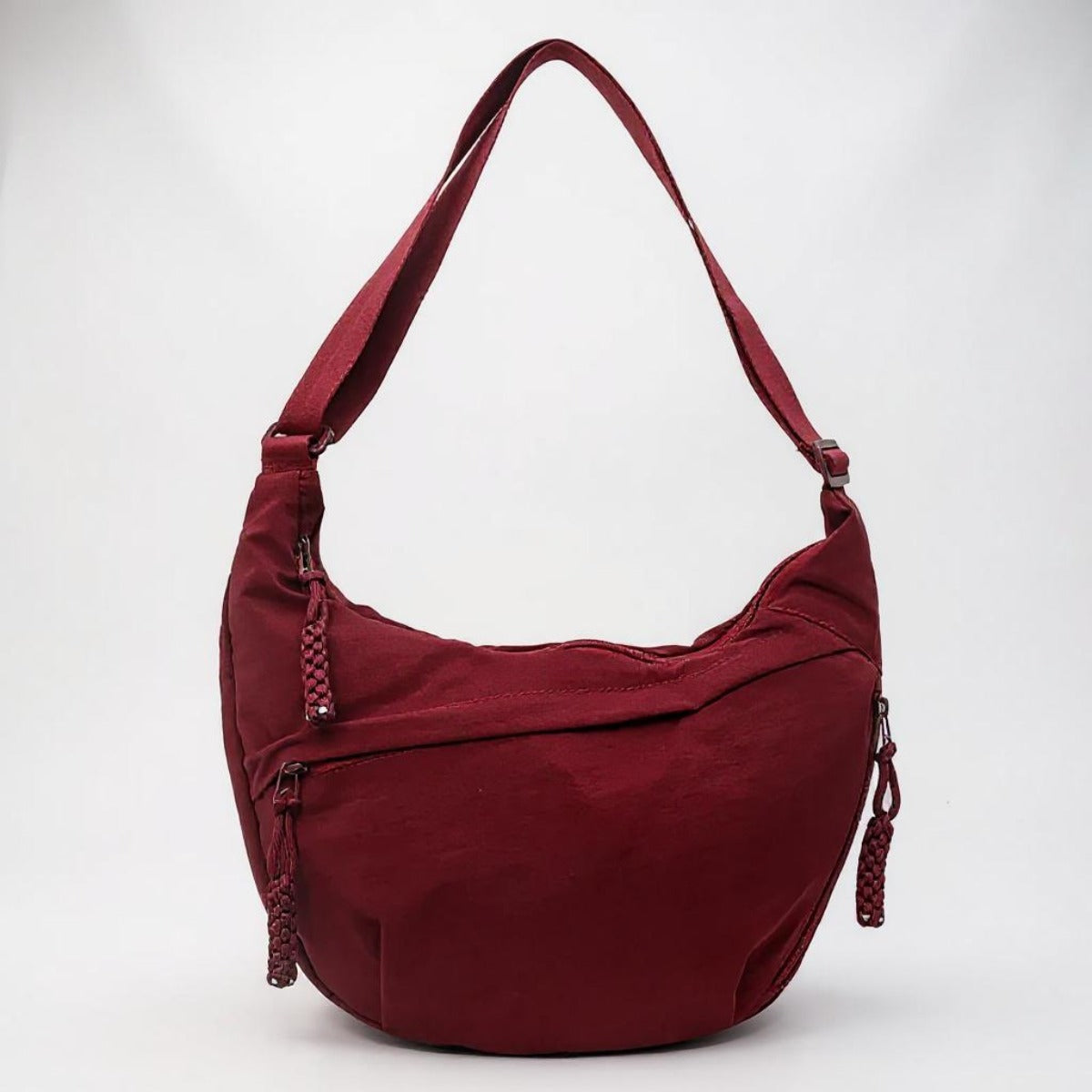 Elina crescent sling bag in Burgundy