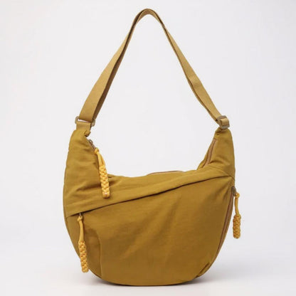 Elina crescent sling bag in Mustard